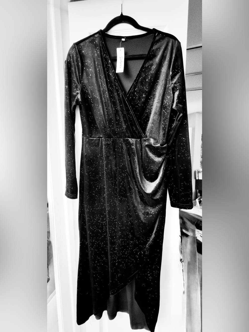 Black Sparkle Long Sleeve Wrap Midi Dress. Side cinch.